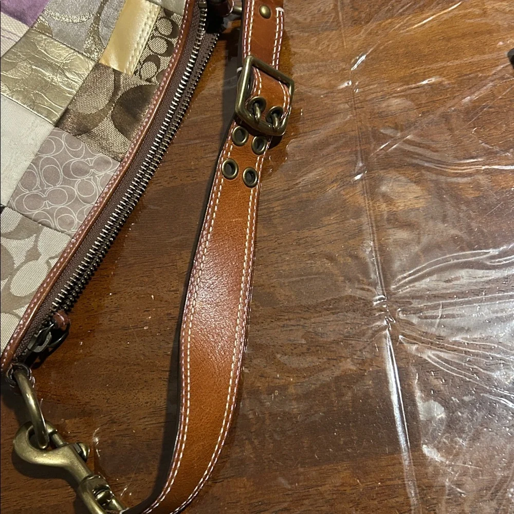 Coach Patchwork Hobo Gold and Cream
Fairly good condition clean inside - Picture 7 of 7